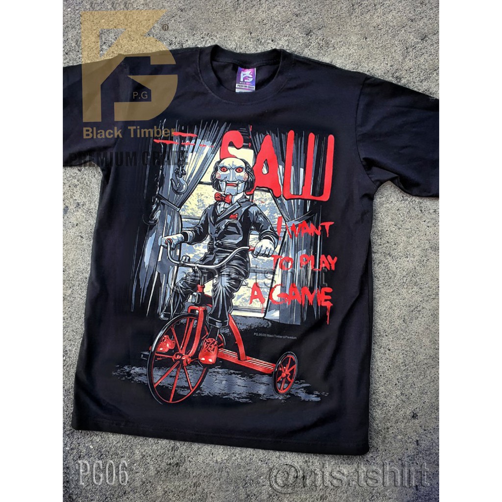 PG 06 Saw เสื้อยืด ลายหนังภาพยนต์ นักร้อง สีดำ สกรีนแน่น ผ้านุ่ม cotton100% S M L XL XXL