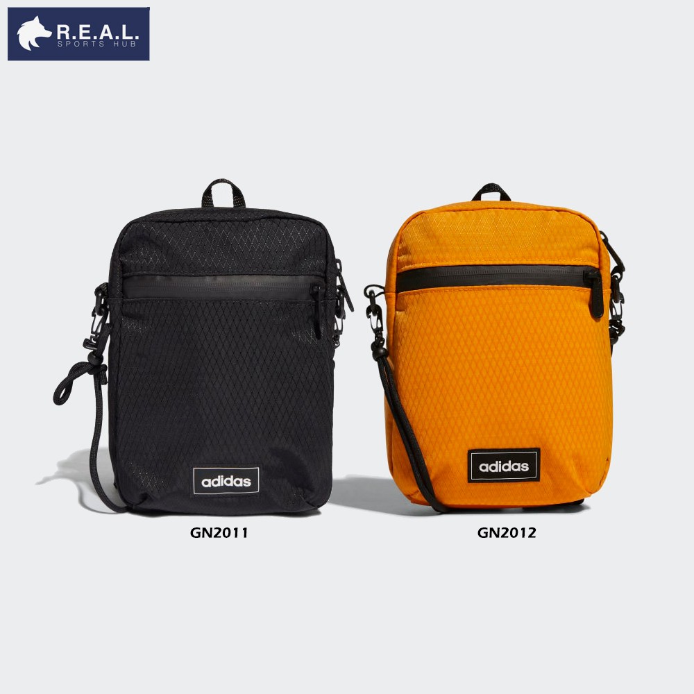 💸ลด65.-ใส่โค้ดTHIKWX1N💸กระเป๋าออร์แกไนเซอร์ Adidas รุ่น Street สีส้มและสีดำ [ GN2011 GN2012 ]