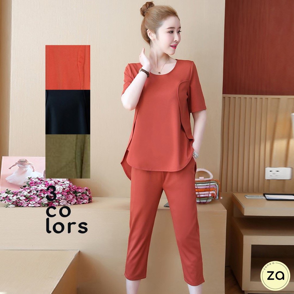 HOT SALE ชุดเซ็ต เสื้อหน้าสั้นหลังยาวทรงใหญ่ กางเกงขาห้าส่วน