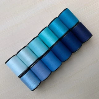 ด้ายเย็บผ้า ด้ายสีฟ้า เฉดฟ้าน้ำทะเล ตราหัวเสือ ด้ายเย็บผ้าหลากสี ด้ายลูกล้อ wop DIY งานฝีมือ เย็บมือ เย็บจักร เบอร์60