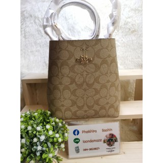 กระเป๋า Bucket สีเบจ ลายซี Coach​ 2312