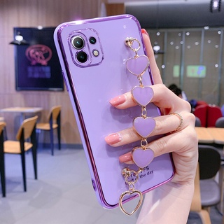 เคสโทรศัพท์มือถือ ซิลิโคนนิ่ม พร้อมสายรัดข้อมือ ลายหัวใจ สําหรับ xiaomi mi 11 lite 11t 11 lite 5g ne 11t pro th01