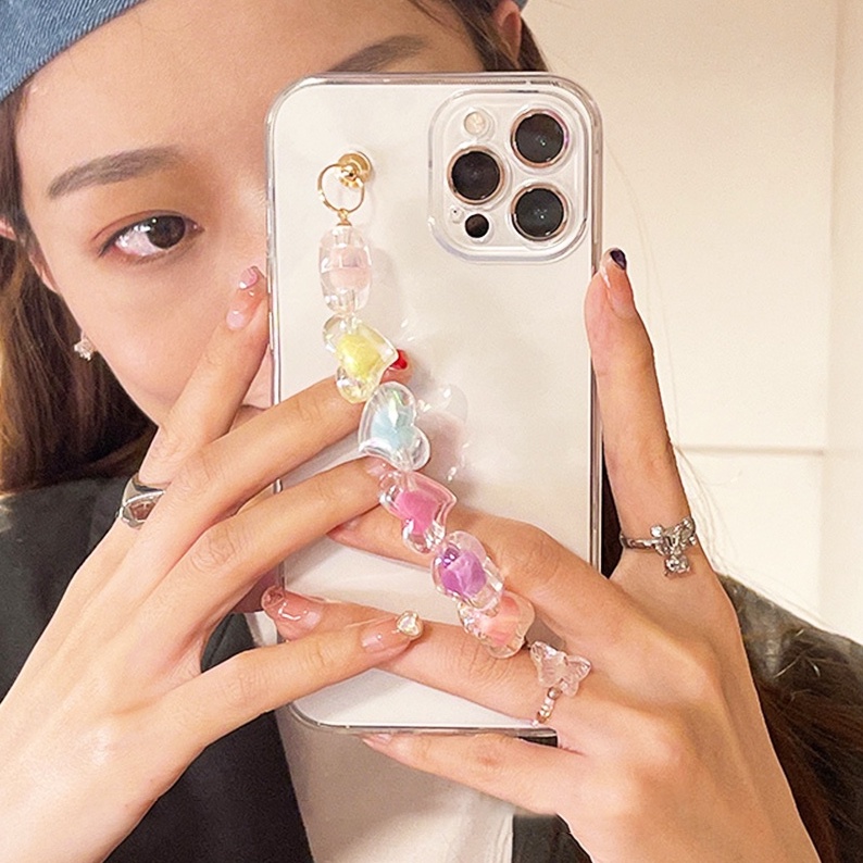 เคสโทรศัพท์มือถือแบบนิ่ม TPU ใส กันกระแทก ลายหัวใจ พร้อมสายคล้องข้อมือ สีหวาน สําหรับ IPhone 13 12 11 Pro Max X Xs XR 8 7 Plus