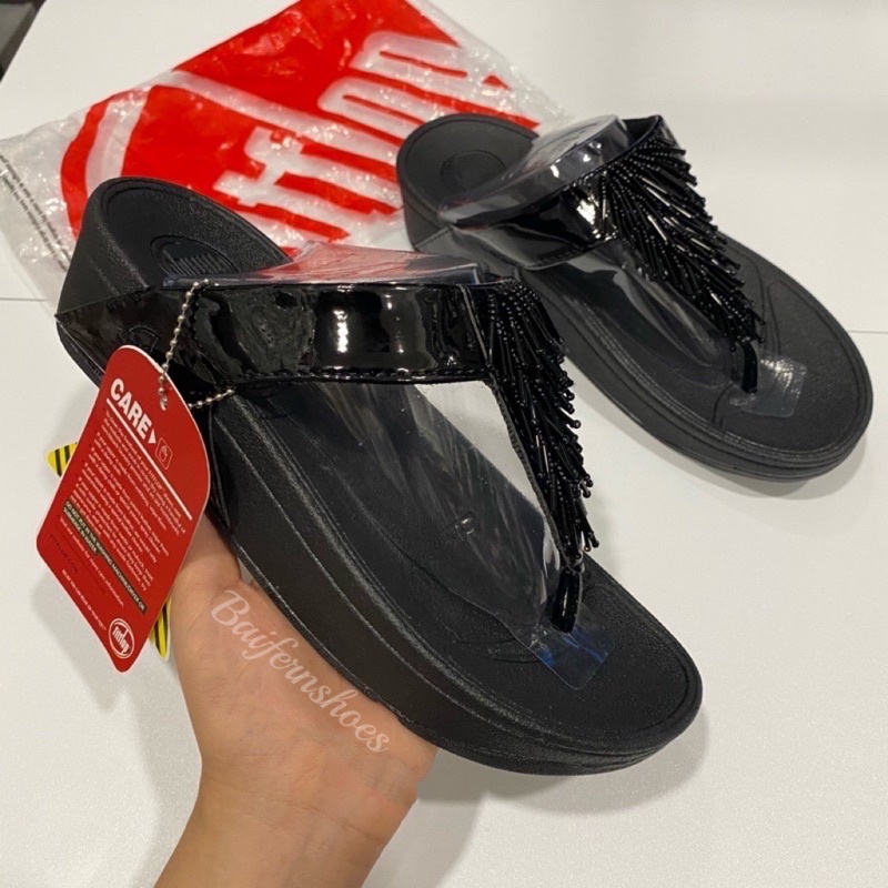 รองเท้าแตะผู้หญิง แบบหูหนีบสายพู่ สไตล์ fitflop พื้นนิ่ม