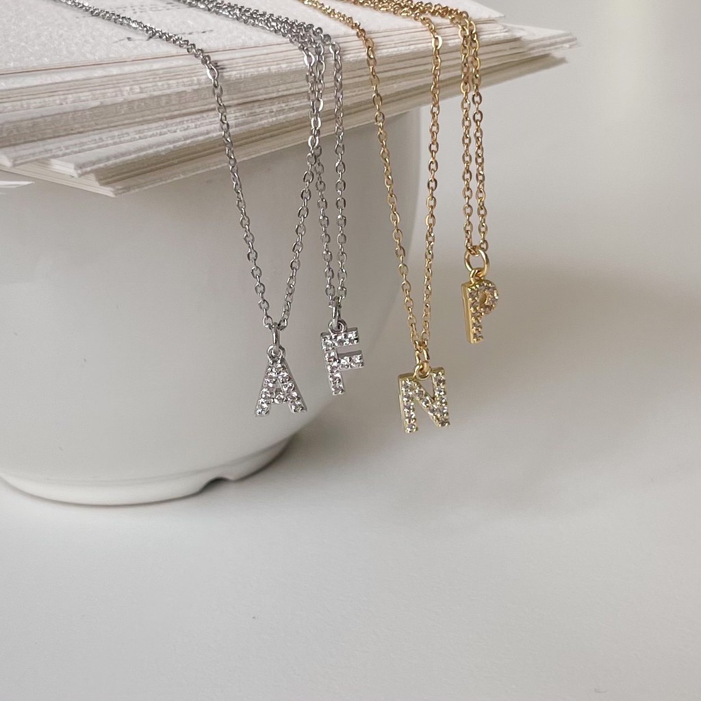 A.piece  จี้ทองเหลือง [ Brass with gold plated ] Shimmer Innitial Pendant จี้ตัวอักษร (142)