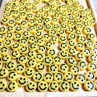 (พร้อมส่ง)ลูกปัดยิ้มสีเหลือง 9มม. 1โหล(12ชิ้น)