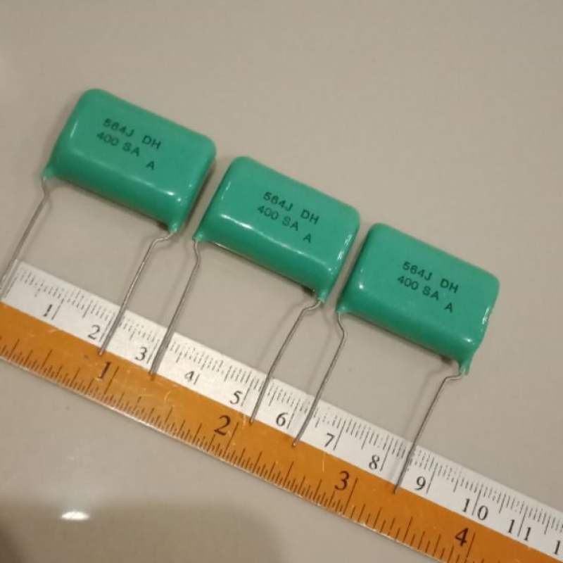 0.56UF 400V 564J 560NF คาปาซิเตอร์ไมล่าญี่ปุ่นสีเขียว ขาห่าง 22มิล แท้-ใหม่จากญี่ปุ่น แพ็ค1ตัว