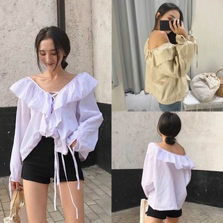 เสื้อเเต่งระบาย