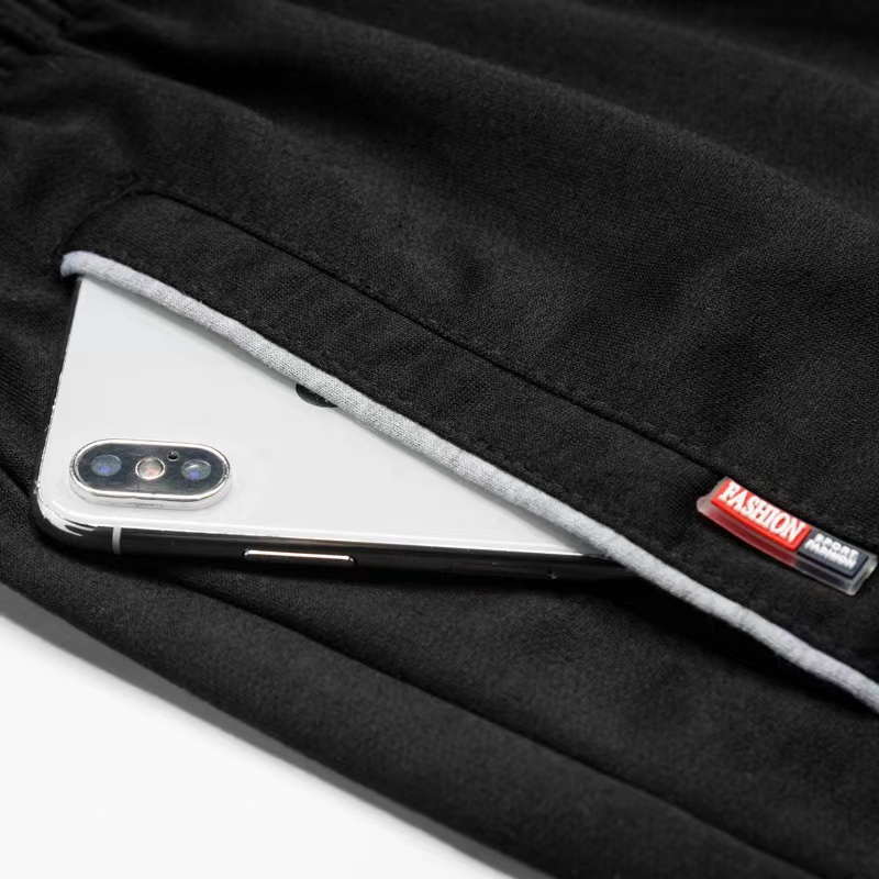 กางเกงลำลองผู้ชายทรงหลวมพลัสไซส์สไตล์เกาหลีเทรนด์เก้าแต้มกางเกงกีฬาแฟชั่น