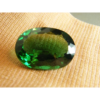 ทัวมาลีน สีเขียว สะอาด รูปไข่ 32X25 มม ( 1 เม็ด ..79 กะรัต ).พลอย ควอตซ์ .LAB CREATED QUARTZ GREEN TOURMALINE COLOR