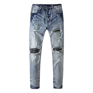 AMIRI patchwork ripped patch distressed washed jeans