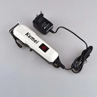 Kemei km809A ปัตตะเลี่ยนตัดผม ไร้สาย ใช้งานสะดวก แถมหวีลองที่ชาร์จในตัว ของแท้