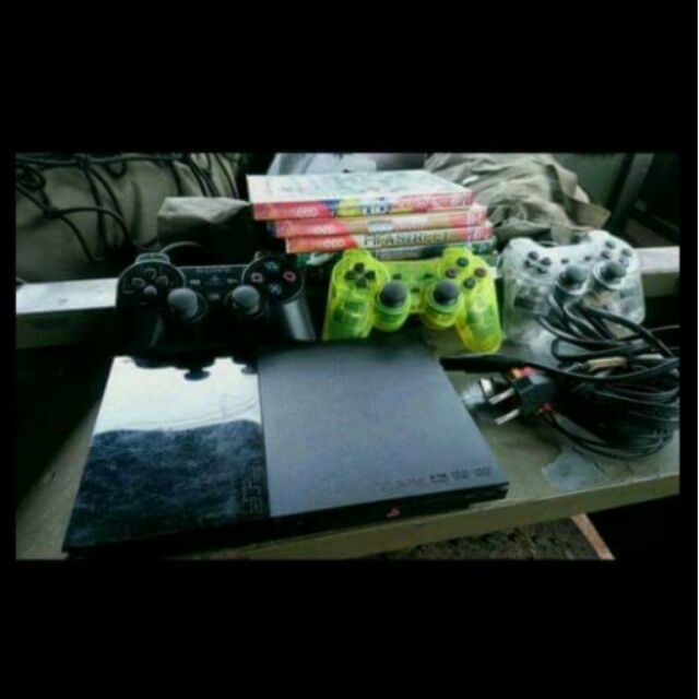 Ps2รุ่นใหม่ล่าสุด90006 หัวอ่านดีมาก ภายนอกเป็นอย่างในภาพแถมจอย3เซฟ1 แผ่นปั๊ม5