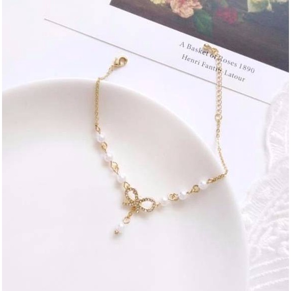 สร้อยข้อมือมุก จี้รูปโบว์ประดับเพชร กำไลข้อมือ สร้อยข้อมือไข่มุก เครื่องประดับผู้หญิง แฟชั่น สไตล์เกาหลี B22 - รูปที่ 6