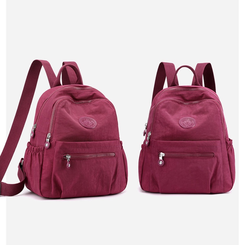 IELGY กระเป๋าเป้สะพายหลังผ้าไนลอนน้ําหนักเบาสําหรับเดินทางพร้อมฟังก์ชั่นความจุขนาดใหญ่และกันน้ํา - รูปที่ 6