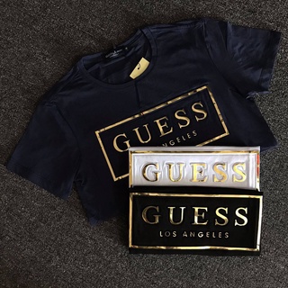 เสื้อยืดแขนสั้นลําลอง พิมพ์ลายโลโก้ GUESSI ขนาดใหญ่ สีบรอนซ์ แฟชั่นคู่รัก สําหรับผู้ชาย และผู้หญิง ไซซ์ S - 5X