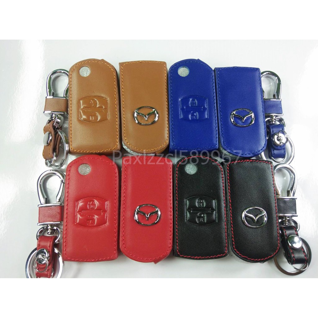 ซองหนังแท้ MAZDA 2,3 [รุ่น 5 ประตู แบบกุญแจพับ 2 ปุ่ม] โลโก้เงิน(พร้อมส่ง)