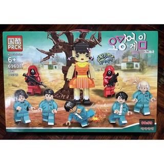 lego squid game 오징어 게임 เลโก้ โมเดล สควิดเกม เกม aeiou หุ่นยนต์เด็กหญิง โกโกวา ชุดสีส้มและต้นไม้ ขนาด 15ซม จำนวน 405 ชิ้น