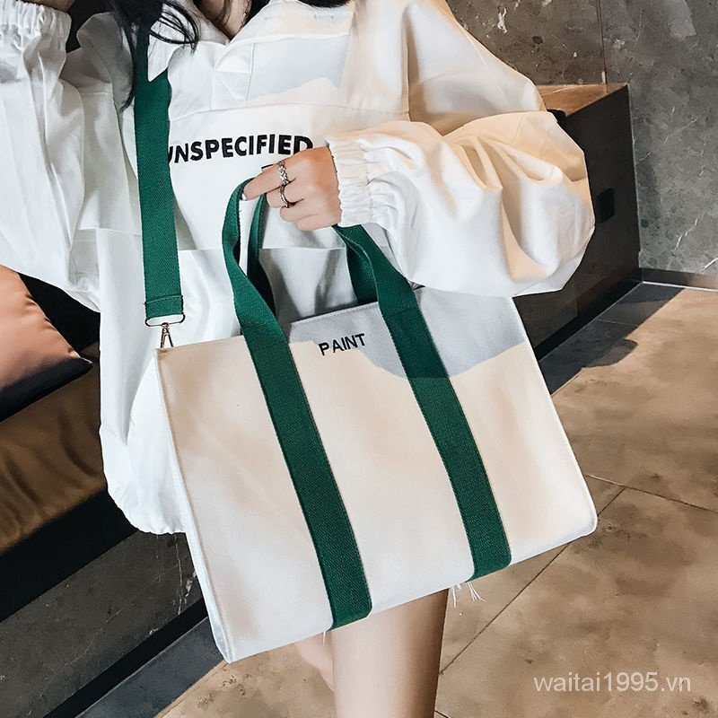 กระเป๋าสะพายไหล่ ผ้าแคนวาส มีซิป แบบพกพา สไตล์ญี่ปุ่น และเกาหลี สําหรับผู้หญิง