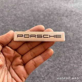 โลโก้ PORSCHE สีเงิน ชิ้นงานอลูมิเนียมบาง ขนาด 8.2x1.7cm