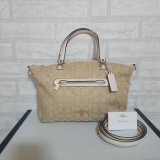 Used coach พัดลายซี สีขาว 13นิ้ว