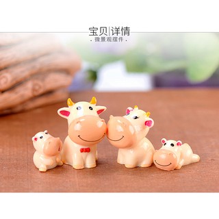 ตุ๊กตาจิ๋ว - ครอบครัววัวน้อยสีส้ม