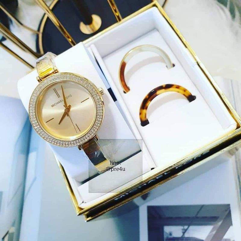 นาฬิกา MK Carey Gold tone watch with bezel