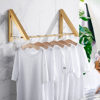 ที่แขวนเสื้อผ้าที่ซ่อนอยู่ในแสงหรูหราไร้หมัดสิ่งประดิษฐ์ที่เก็บของอเนกประสงค์ในครัวเรือนที่แขวนเย็นเสื้อผ้าเด็กสนับสนุนถ