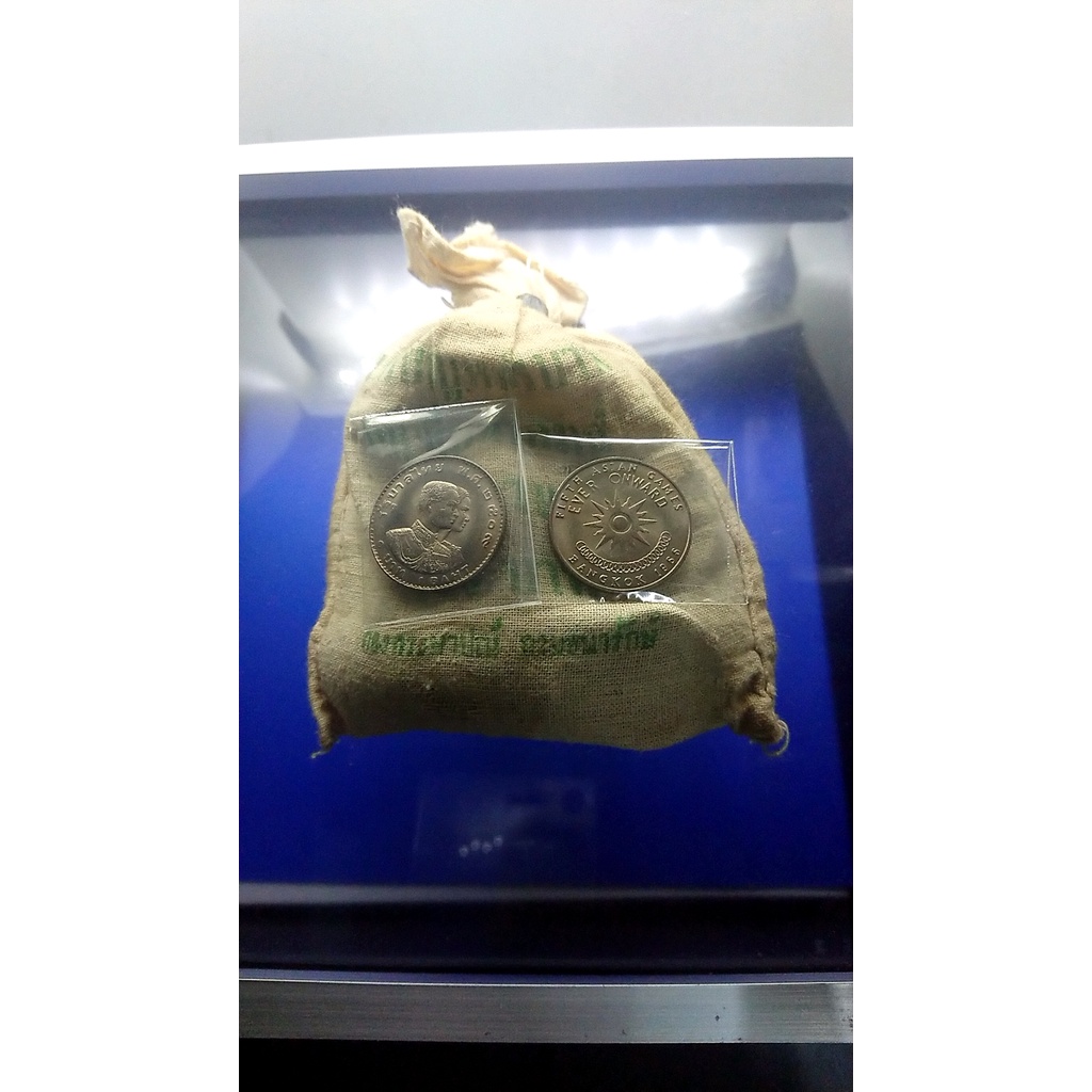 เหรียญ 1 บาท(ยกถุง 100 เหรียญ) เหรียญที่ระลึกวาระ การแข่งขันกีฬา เอเชี่ยนเกมส์ ครั้งที่ 5 unc ปี 250