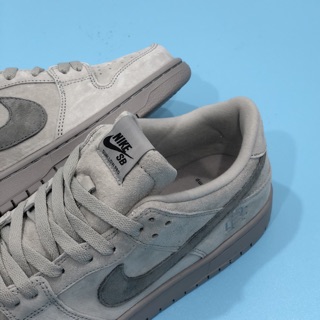 nike sb dunk low pro qs reigning champion grey