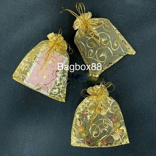 (1ห่อมี10ใบ) ถุงผ้าแก้วพิมพ์ลวดลายทอง ขนาด9x12cm ใช้ใส่กล่องพระ ใส่กำไลหิน ใส่ของชำร่วย