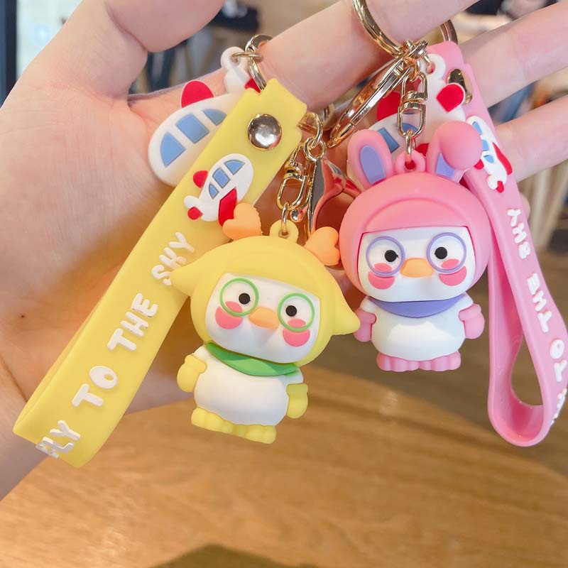 พวงกุญแจ จี้การ์ตูนเป็ดน่ารัก ขนาดเล็ก เหมาะกับของขวัญ สําหรับกระเป๋านักเรียน - รูปที่ 2
