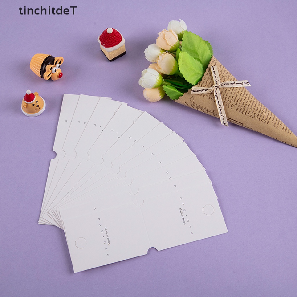 [TinchitdeT] [ขายดี] ป้ายแท็กกระดาษแข็ง แบบพับได้ สีขาว สําหรับแขวนแสดงเครื่องประดับ ต่างหู สร้อยข้อมือ ผม ยางรัดผม 50 ชิ้น