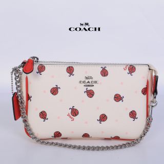 กระเป๋า COACH HANDLE POUCH SIGNATURE LADYBUG PRINT