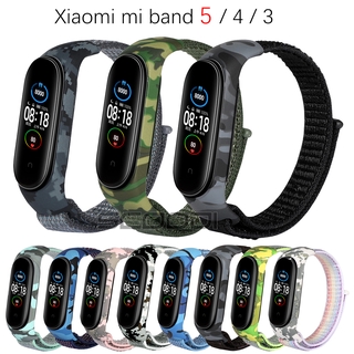 สายนาฬิกาข้อมือไนล่อน ลายพราง แบบเปลี่ยน สําหรับ Xiaomi Mi Band 5/4/3 NFC