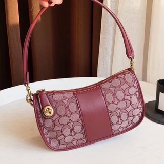 Coach SWINGER BAG IN SIGNATURE