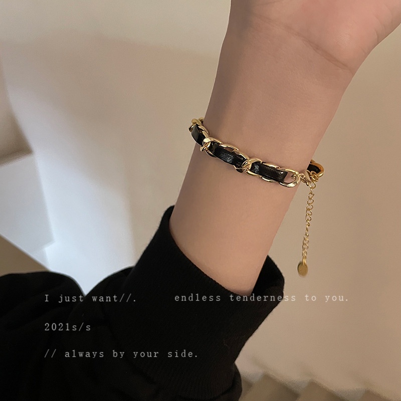 สร้อยข้อมือหนังถัก ระดับไฮเอนด์ สไตล์เรโทร เรียบง่าย เครื่องประดับแฟชั่น สําหรับผู้หญิง