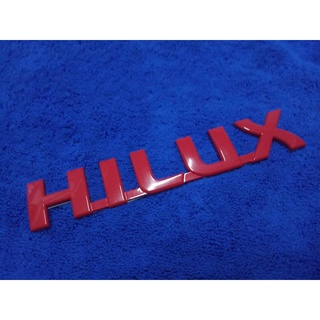 B.S.D โลโก้ HILUX (VIGO) สีแดง 3.4×18.5cm  1ชิ้น