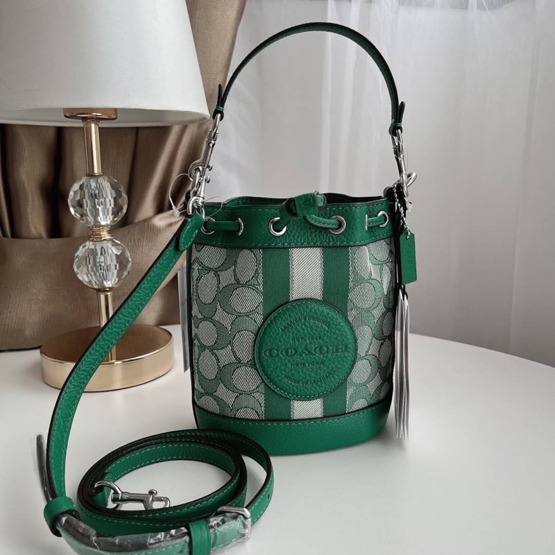 MINI DEMPSEY BUCKET BAG IN SIGNATURE JACQUARD WITH STRIPE AND COACH PATCH (COACH C8322)