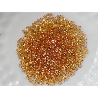 1.5mm. พลอยบุษราคัมกลมเจียรเกลี่ยม ราคากะรัตละ 550 บาท