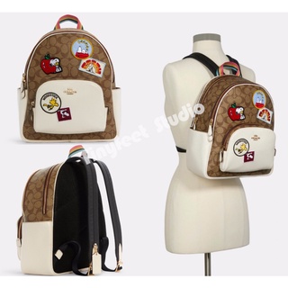 Coach C4115 กระเป๋าเป้สะพายหลัง Peanuts Court ในผ้าใบลายเซ็นพร้อม Varsity Patches Women Bag