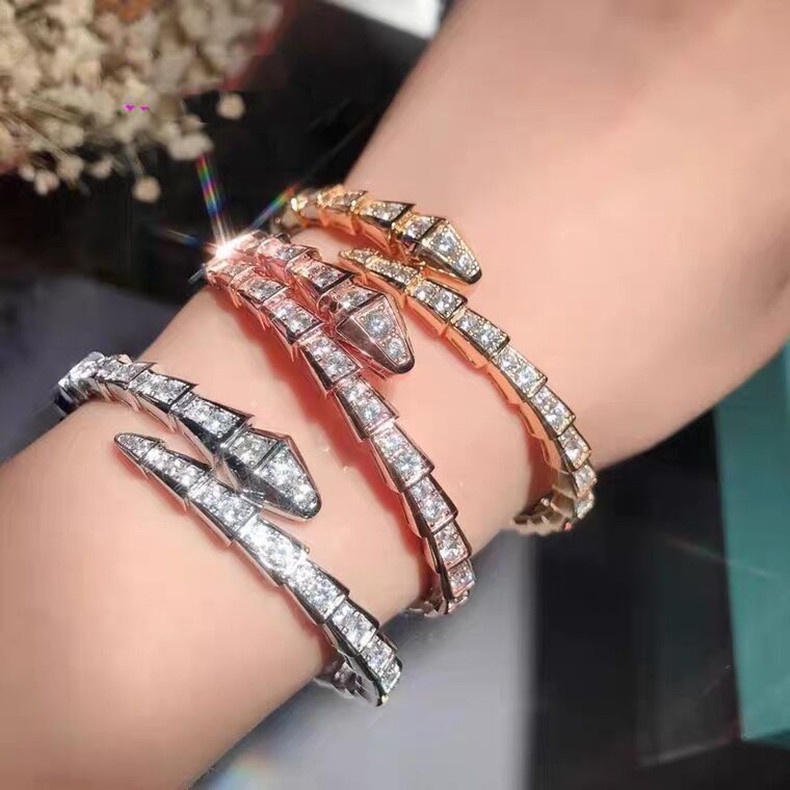เครื่องประดับ สร้อยข้อมือไทเทเนียมเหล็ก ชุบทอง 18K รูปงู ประดับเพชร ปรับได้
