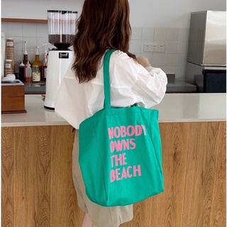 กระเป๋าผ้า Nobody owns the beach  กว้าง35 cm ยาว 36 cm  ราคา (1) (8) (0)฿  👇👇👇👇👇👇👇👇