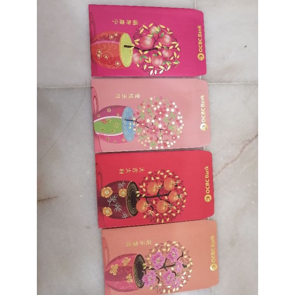 OCBC ang pao แพ็คเก็ตสีแดง 8 ชิ้น 4 แบบ