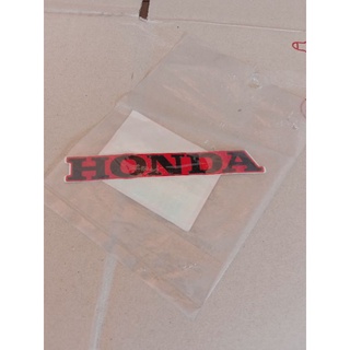 สติ๊กเกอร์แท้ HONDA สีดำพื้นสีแดง ติดบังลมเวฟ100Sปี2000-2004รกสีแดง,1ชิ้น 87130KRS600ZB