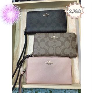 ‼️📣📣Coach Phone Wallet In Signature Coated Canvas.