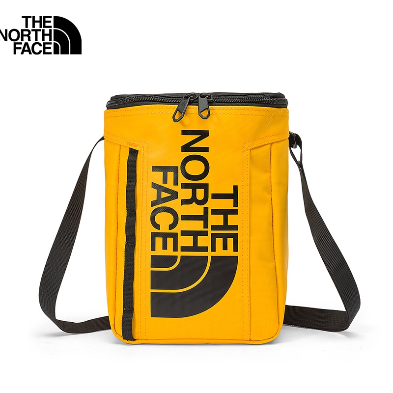 THE NORTH FACE YOUTH BASE CAMP POUCH - SUMMIT GOLD/TNF BLACK กระเป๋าคาดเฉียง