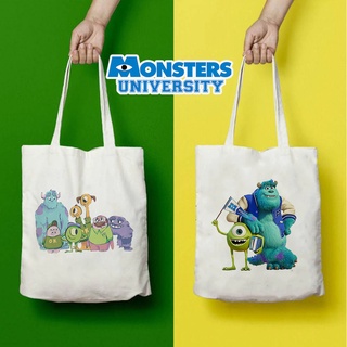 กระเป๋าสะพายไหล่ กระเป๋าช้อปปิ้ง ผ้าแคนวาส พิมพ์ลาย Monsters University สําหรับผู้หญิง และนักเรียน