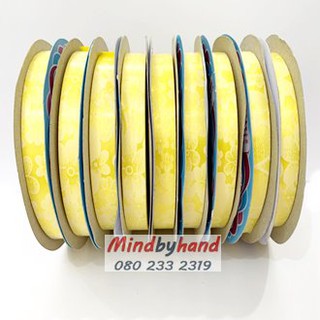 ริบบิ้นพับเหรียญโปรยทาน ลายดอกไม้สีเหลือง  (30380)