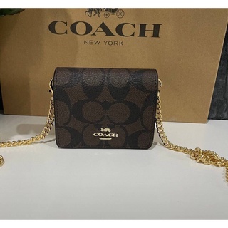 COACH MINI WALLET IN SIGNATURE CANVAS WITH DAISY PRINT